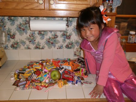 Kasen with a pile of candy